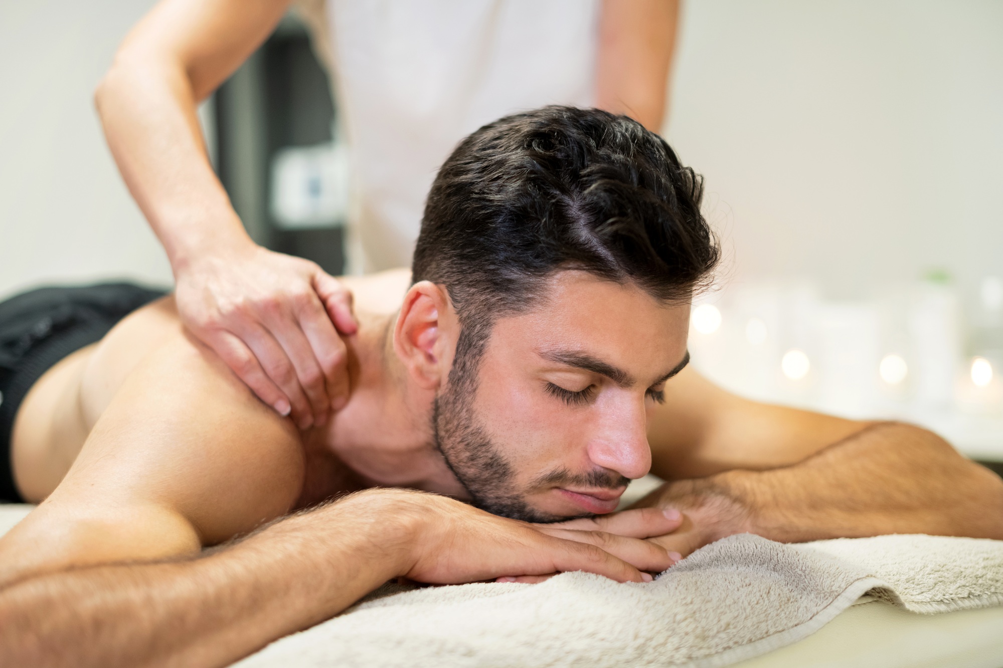 Man relaxing during massage session
